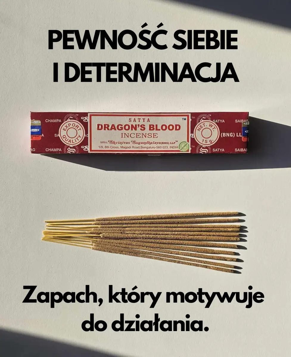 Czerwone pudełko kadzideł Satya Dragon's Blood 15g leżące nad grupą jasnobrązowych patyczków na białym tle z wyraźnym, ostrym cieniem.